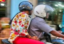 ఫోన్ మైకంలో మరో వ్యక్తి బైక్ ఎక్కిన భార్య